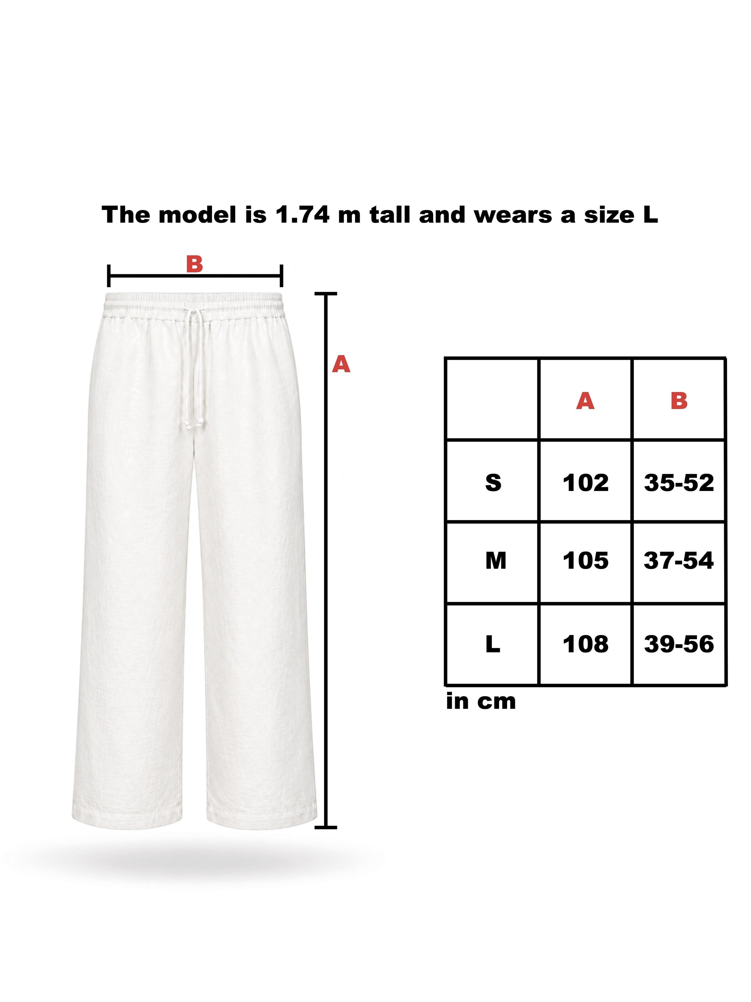 SHAMBLES Wide leg Trousers in White