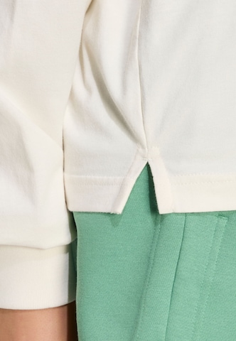 ADIDAS SPORTSWEAR - Camiseta funcional 'Studio' en blanco