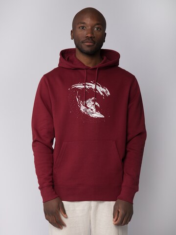 Sweat-shirt ' Surfing Spaceman ' Watapparel en rouge : devant