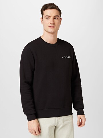 TOMMY HILFIGER Sweatshirt in Black: front