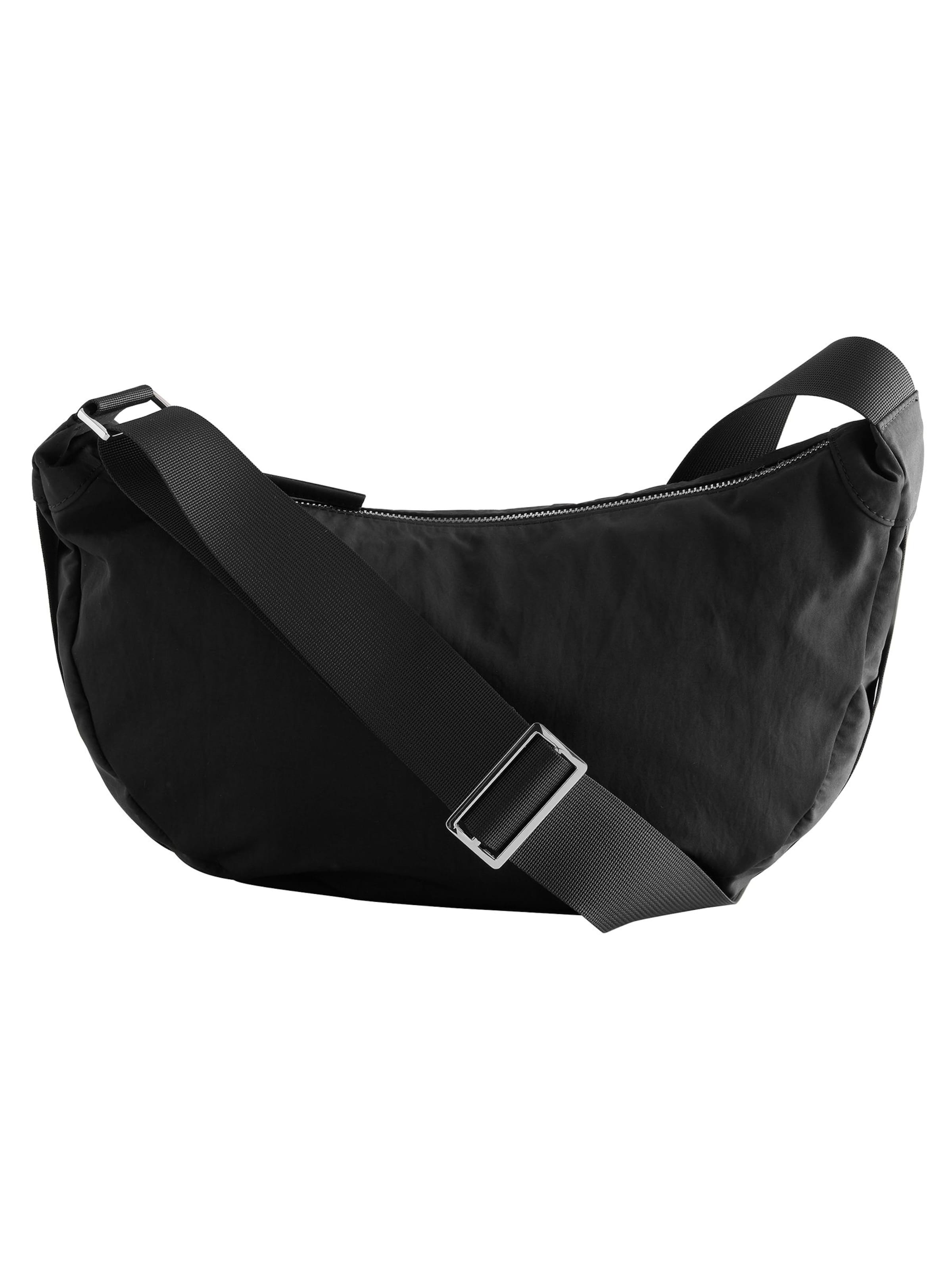 Next Schultertasche in Schwarz: Vorderseite