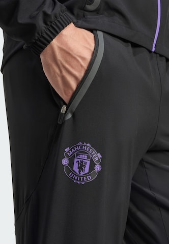 Tapered Pantaloni sportivi 'Manchester United Tiro 25' di ADIDAS PERFORMANCE in nero