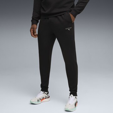 PUMA Regular Sports trousers in Black: front