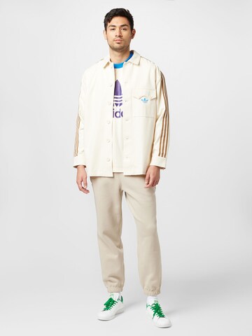 Tapered Pantaloni 'Premium Essentials' di ADIDAS ORIGINALS in beige