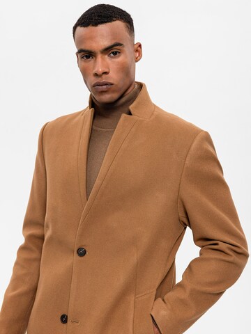 Antioch Between-seasons coat in Brown