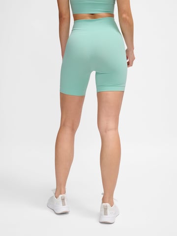 Hummel Skinny Sportbroek in Groen