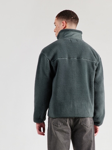 ABOUT YOU - Chaqueta polar 'Diego' en verde