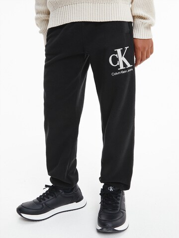 Calvin Klein Jeans Tapered Pants in Black: front