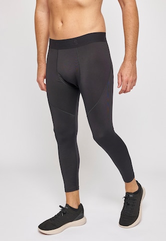 SNOCKS Skinny Workout Pants in Black: front
