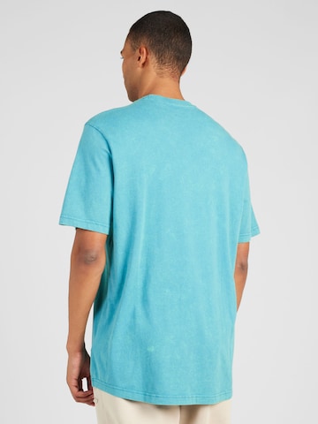 ADIDAS SPORTSWEAR - Camisa funcionais em azul