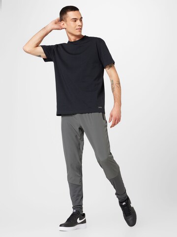 Tapered Pantaloni sportivi 'BLAG' di Virtus in grigio