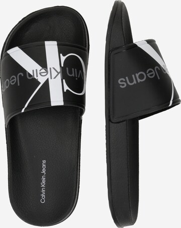 Calvin Klein Jeans Beach & Pool Shoes in Black