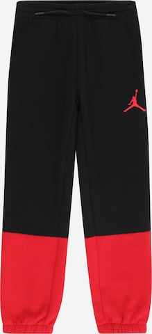 Jordan Tapered Trousers in Black: front