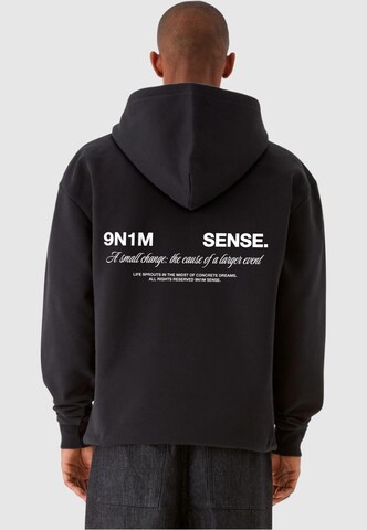9N1M SENSE Sweatshirt 'Change' in Zwart: voorkant