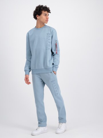 ALPHA INDUSTRIES Sweatshirt 'Emb' in Blau