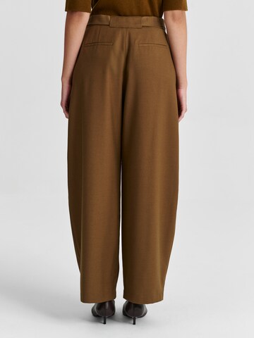 Wide leg Pantaloni con pieghe 'Anaiso' di TATUUM in verde