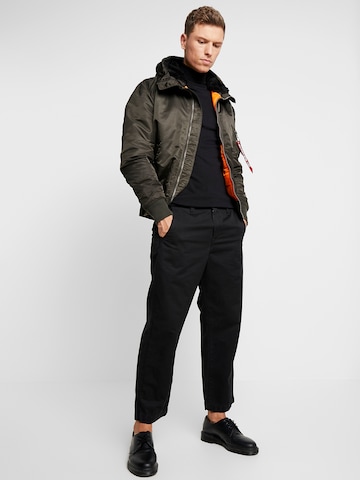 ALPHA INDUSTRIES Winter Jacket 'Ma-1' in Green