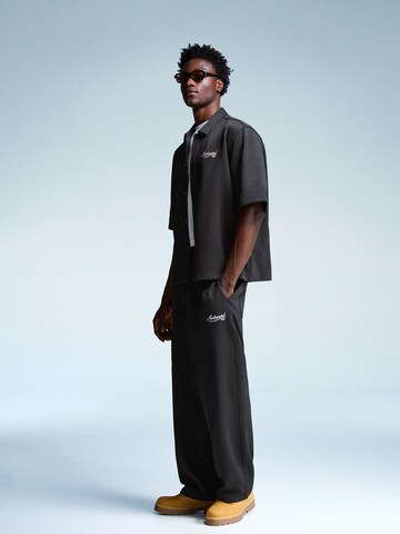 Baggy Pantalon Bershka en noir : devant