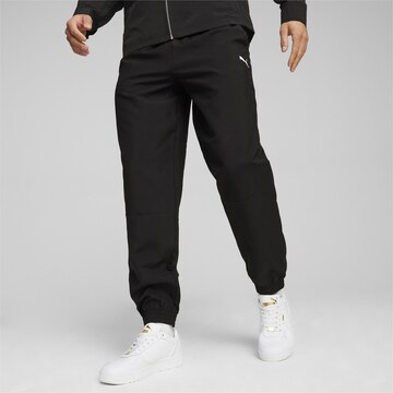 PUMA Tapered Sportbroek 'Rad/Cal' in Zwart: voorkant