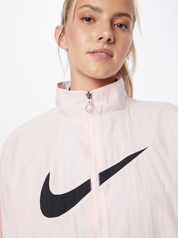 rožinė Nike Sportswear Demisezoninė striukė 'Essential'