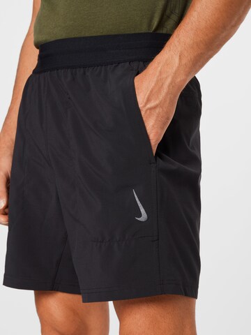 NIKE Regular Sportbroek in Zwart