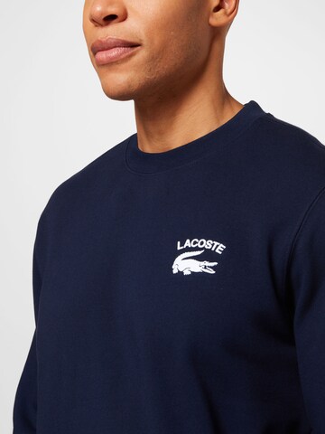 Sweat-shirt LACOSTE en bleu