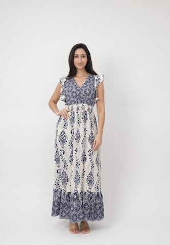 Elara Kjole i blå: forside