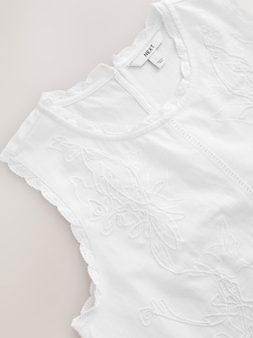 Haut Next en blanc