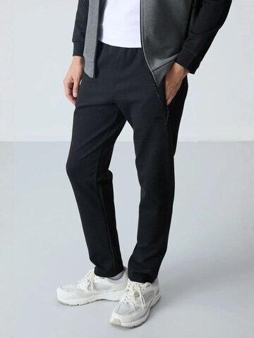 Survêtement 'Aktive Sets' Tommy Life en mélange de couleurs
