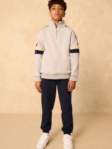 Set Next en gris