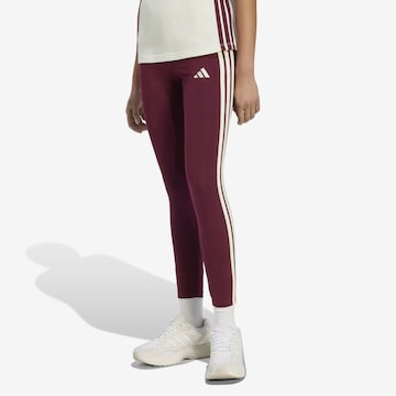 ADIDAS SPORTSWEAR Skinny Urheiluhousut 'Essentials' värissä punainen: etupuoli