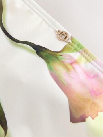 Next Bikinihousut värissä beige