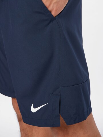 Regular Pantalon de sport 'FLEX' NIKE en bleu