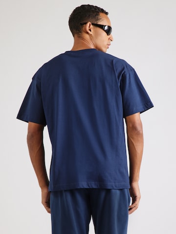 ELLESSE - Camiseta 'Suisio' en azul