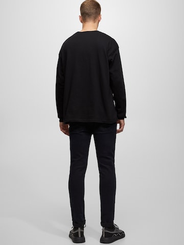 Pull&Bear Skinny Jeans in Schwarz