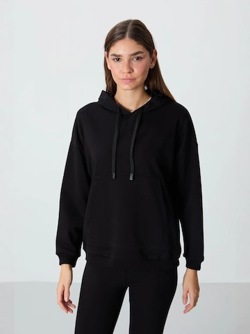 Felpa di Tommy Life in nero: frontale