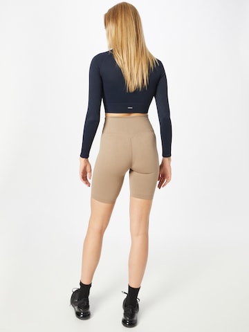 Skinny Pantaloni sportivi 'Espresso' di aim'n in marrone