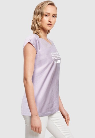T-shirt 'Never Too Late' Merchcode en violet