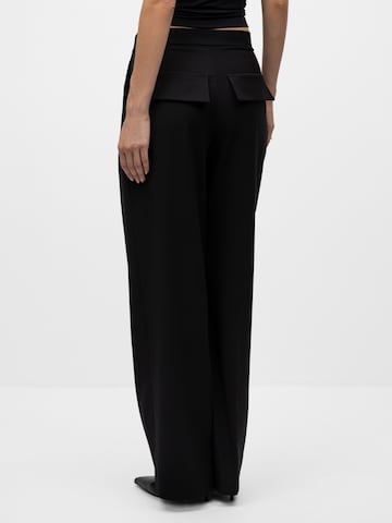 mandragora - Pierna ancha Pantalón 'Theo' en negro