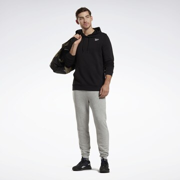 Effilé Pantalon de sport Reebok en gris