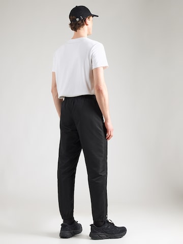 Sergio Tacchini Tapered Παντελόνι 'CARSON 021' σε μαύρο: πίσω