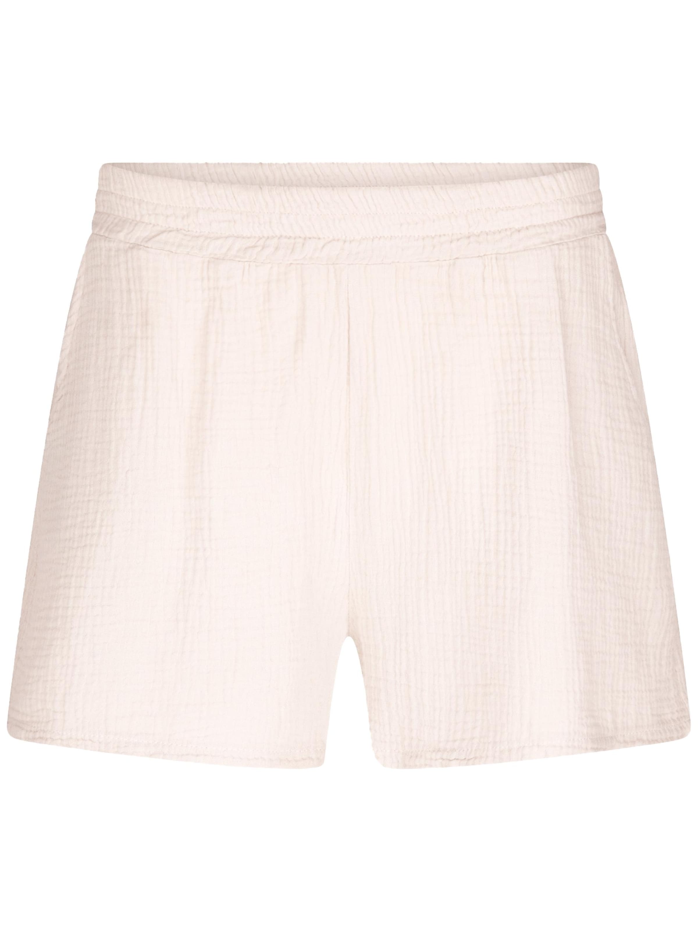 SASSYCLASSY Pants in Beige: front