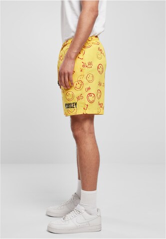 Karl Kani Loose fit Pants in Yellow