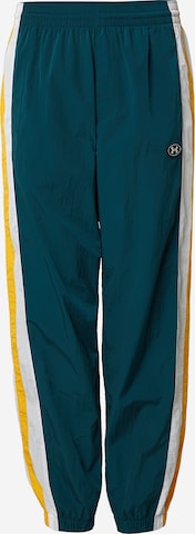 UNDER ARMOUR - Pantalón deportivo en verde: frente