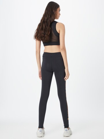 UNDER ARMOUR Skinny Workout Pants 'Favorite' in Black