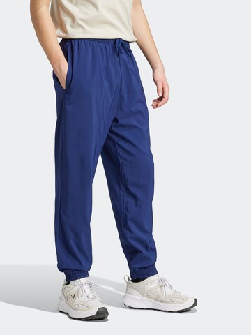 ADIDAS SPORTSWEAR Tapered Sportbroek 'Essentials' in Blauw: voorkant