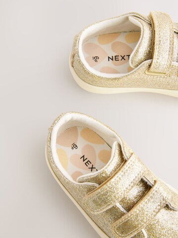 Baskets Next en or