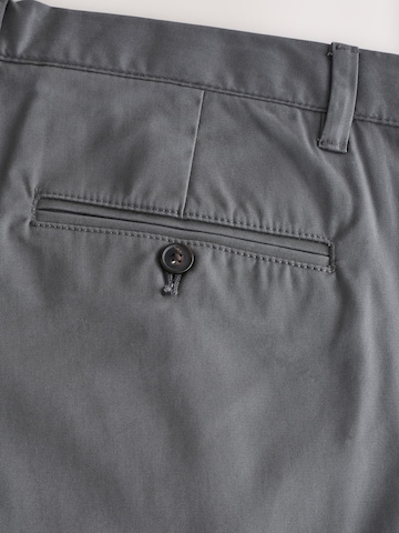 Slimfit Pantaloni chino di Next in grigio