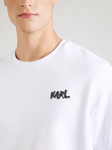 balta Karl Lagerfeld Megztinis be užsegimo