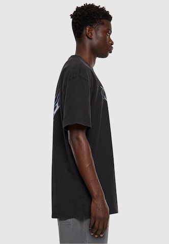 MT Upscale - Camiseta 'Cagedchrome Acid' en negro